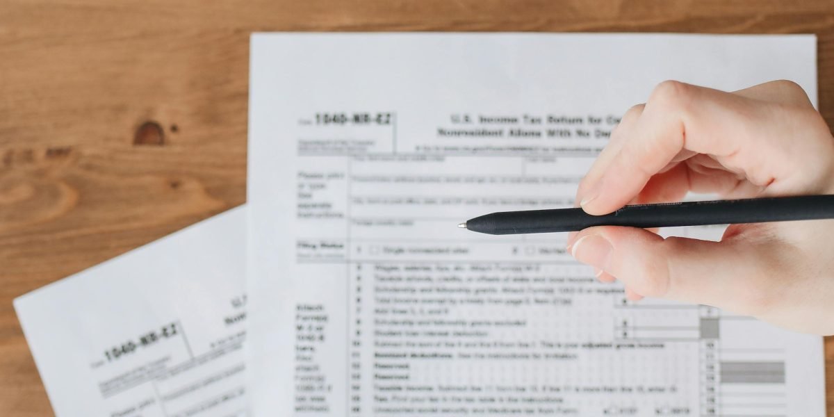 An individual reviewing important legal documents, emphasizing the importance of understanding regulations.