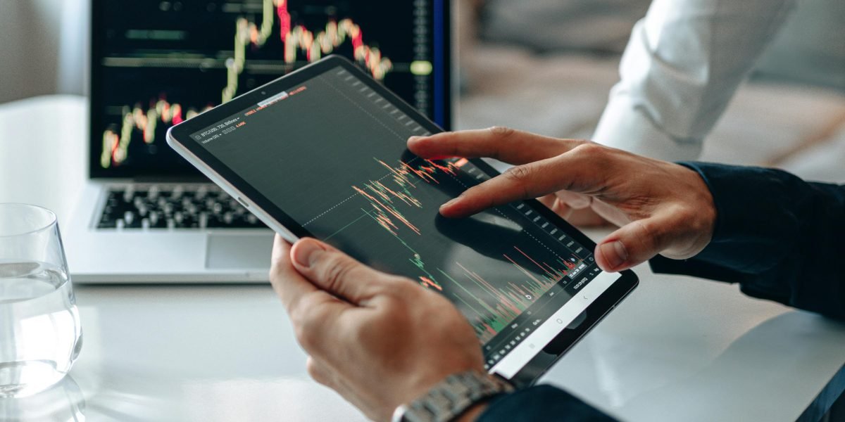 An investor meticulously checking details and calculating potential costs, highlighting the importance of due diligence.