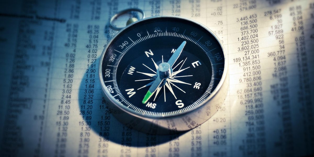 A business owner discusses tax filing strategies with an accountant to ensure compliance and efficiency.