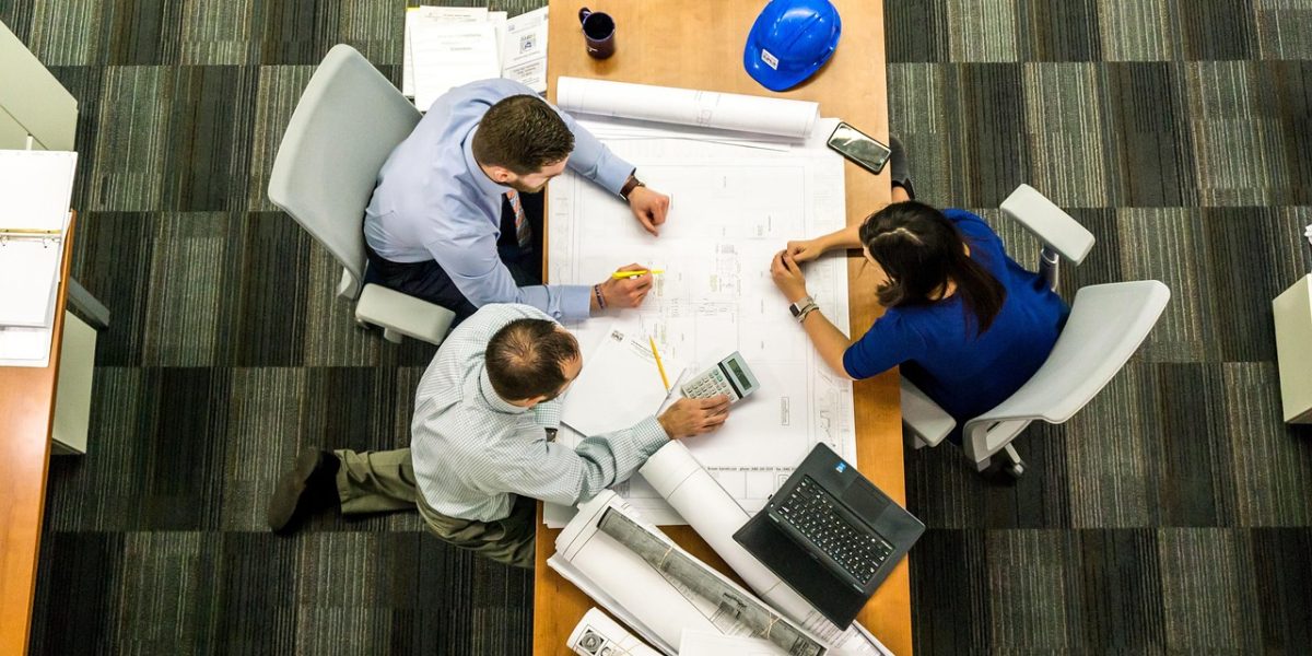 A marketing team collaborates, strategizing how to leverage customer insights for better engagement.
